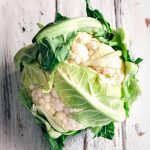 cauliflower on white wooden surface